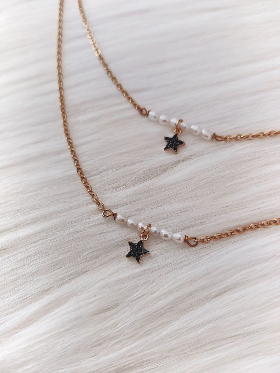 Collana micro perle di fiume e stellina zirconi neri