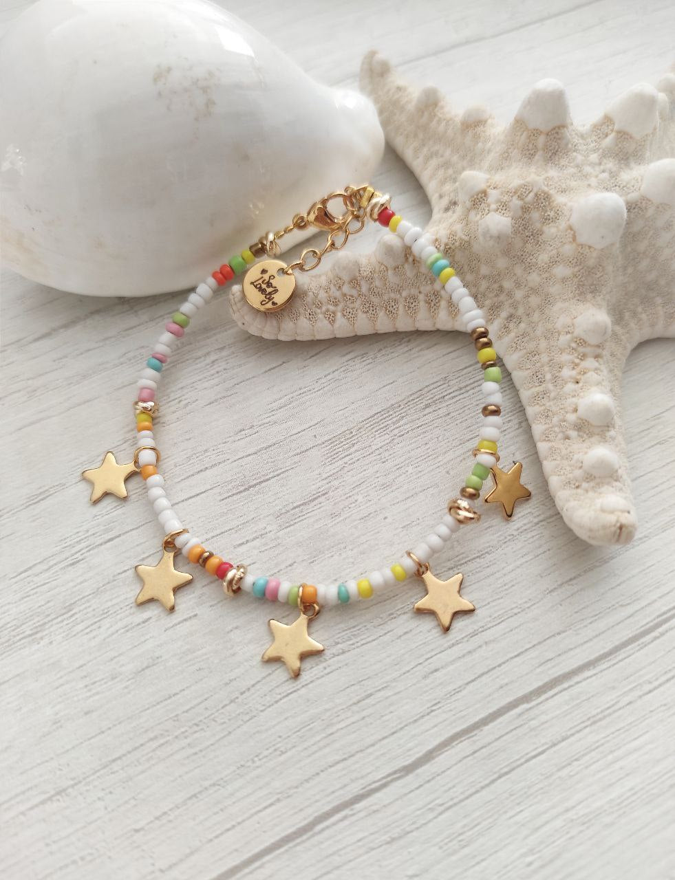 Bracciale perline multicolor e stelle
