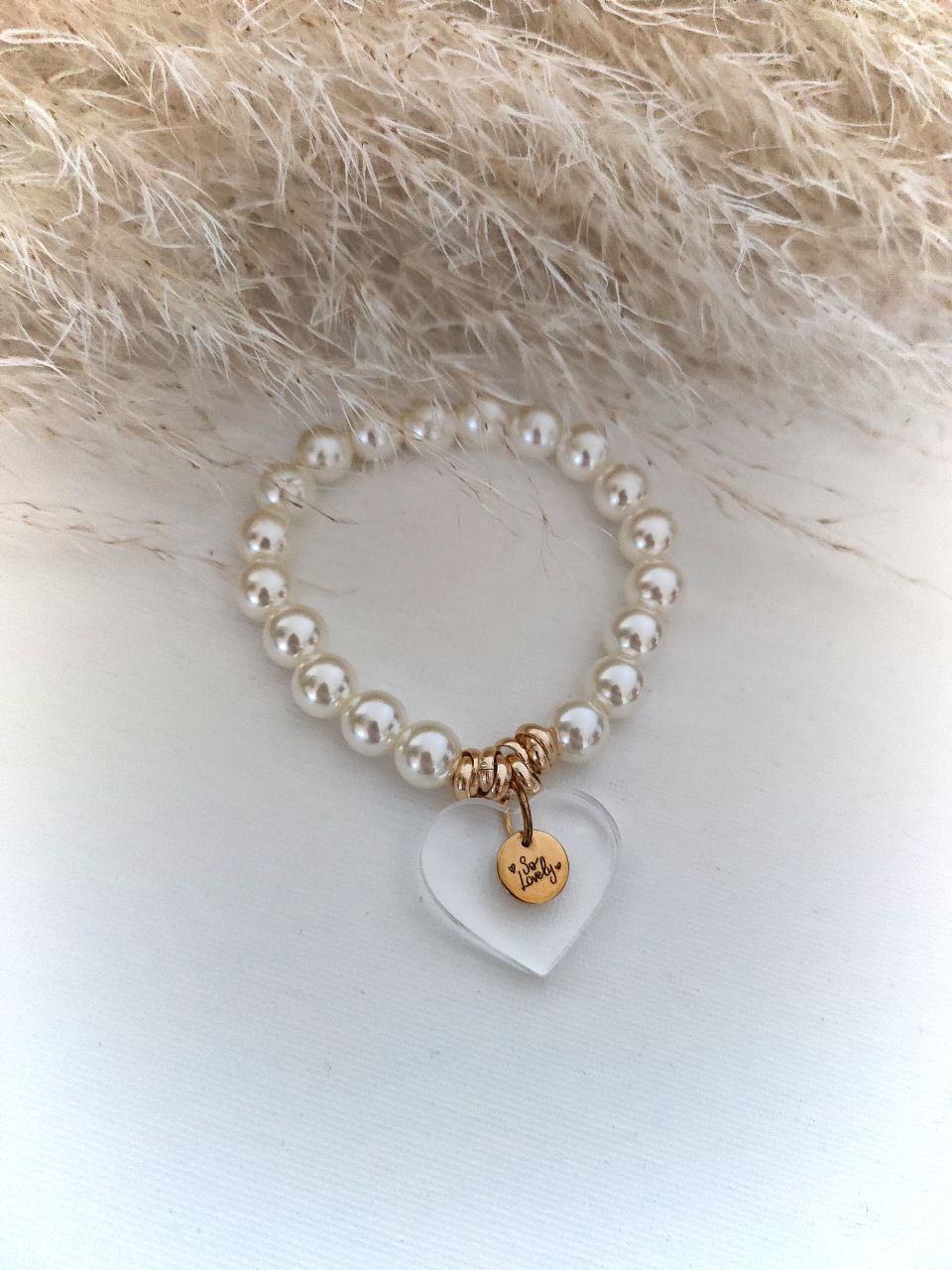 Bracciale perle con cuore plexi