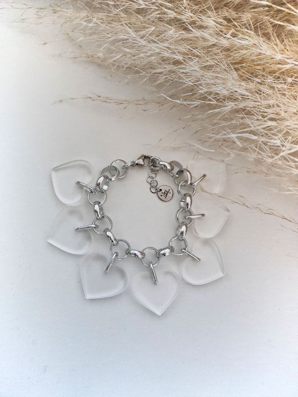 Bracciale argento con ciondoli cuori plexi